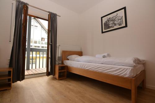 Imagen de la habitación del Hotel SMARTHOTEL Aalen. Foto 19
