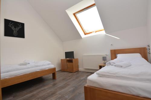 Imagen de la habitación del Hotel SMARTHOTEL Aalen. Foto 20