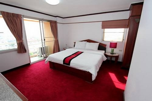 Imagen de la habitación del Hotel SN Mansion. Foto 32