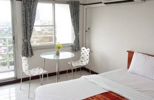 Imagen de la habitación del Hotel SN Mansion. Foto 34