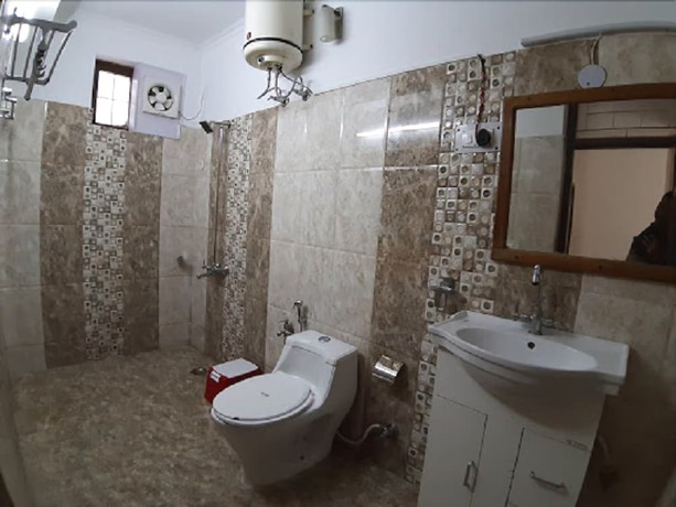 Imagen de la habitación del Hotel SN Residency. Foto 3