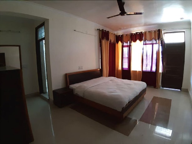 Imagen de la habitación del Hotel SN Residency. Foto 6