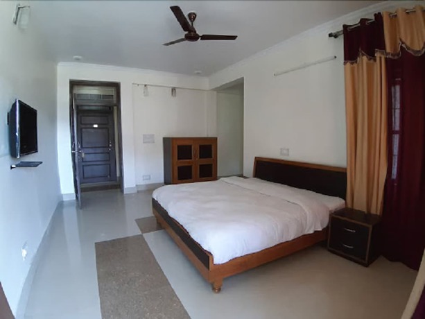 Imagen de la habitación del Hotel SN Residency. Foto 7