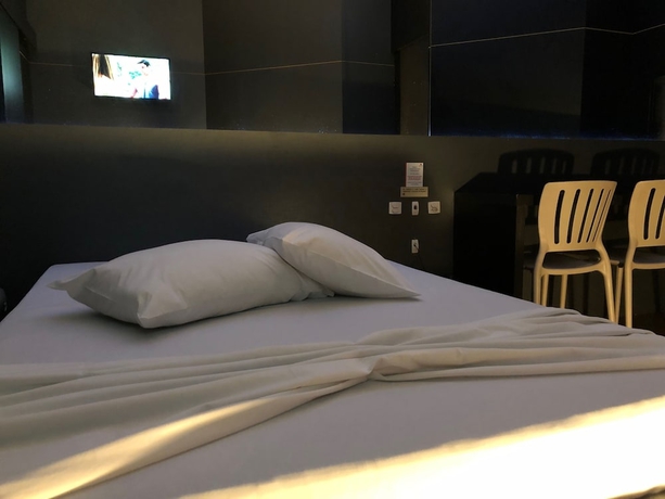 Imagen de la habitación del Hotel SNOB Motel. Foto 13