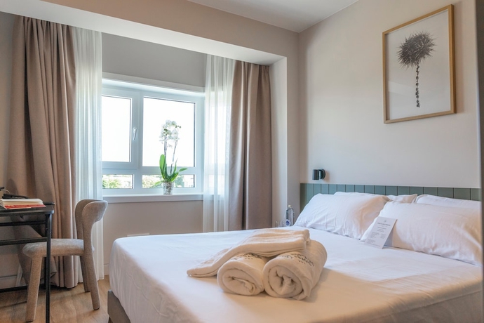 Imagen de la habitación del Hotel SN&Ouml; Porta das Fragas. Foto 11