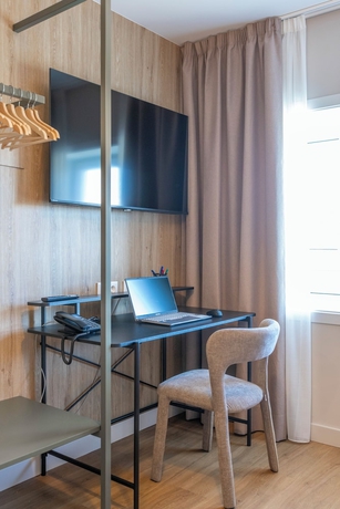 Imagen de la habitación del Hotel SN&Ouml; Porta das Fragas. Foto 12
