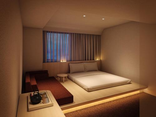 Imagen de la habitación del Hotel SOKI KANAZAWA. Foto 6