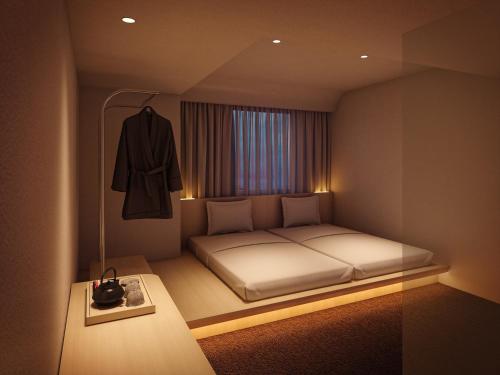 Imagen de la habitación del Hotel SOKI KANAZAWA. Foto 8