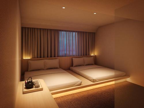 Imagen de la habitación del Hotel SOKI KANAZAWA. Foto 10