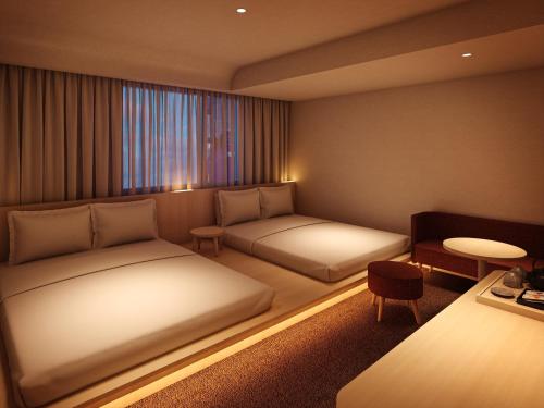 Imagen de la habitación del Hotel SOKI KANAZAWA. Foto 11