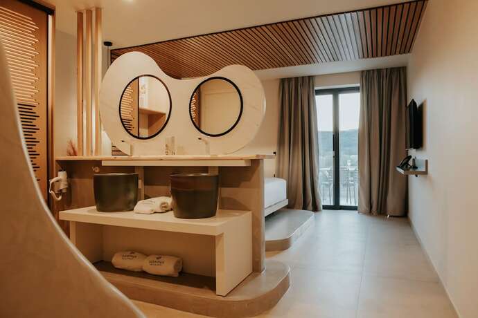 Imagen de la habitación del Hotel SOMNUS SUITES. Foto 18