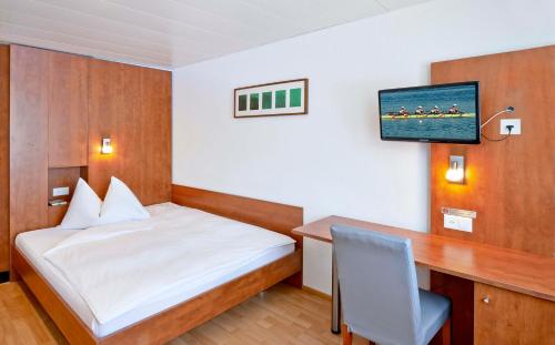 Imagen de la habitación del Hotel SORELL HOTEL AARAUERHOF. Foto 4