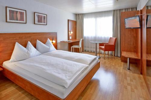 Imagen de la habitación del Hotel SORELL HOTEL AARAUERHOF. Foto 9