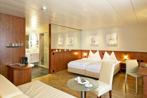 Imagen de la habitación del Hotel SORELL HOTEL AARAUERHOF. Foto 10