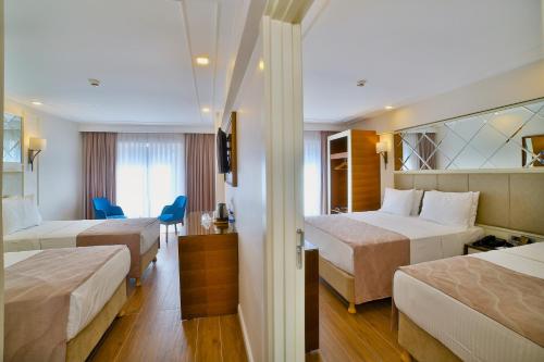 Imagen de la habitación del Hotel SORRISO HOTEL DUE. Foto 5