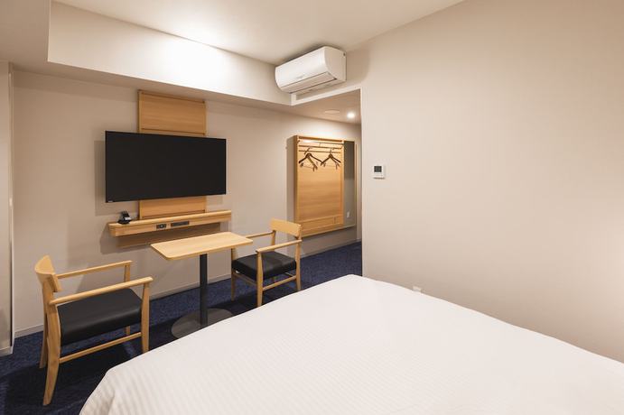 Imagen de la habitación del Hotel SOTETSU GRAND FRESA KUMAMOTO. Foto 11