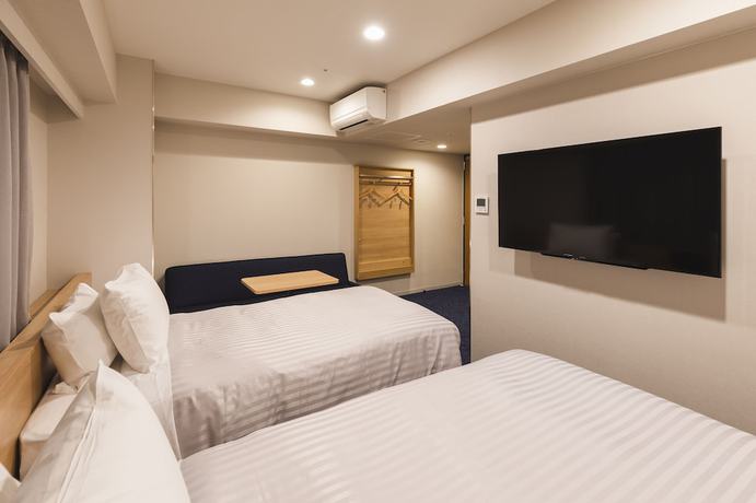 Imagen de la habitación del Hotel SOTETSU GRAND FRESA KUMAMOTO. Foto 13