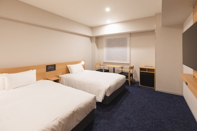 Imagen de la habitación del Hotel SOTETSU GRAND FRESA KUMAMOTO. Foto 14