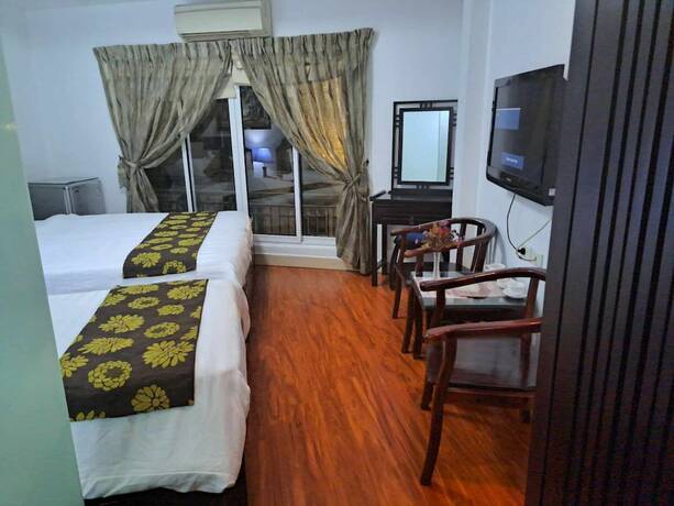 Imagen de la habitación del Hotel SOUTH GATE HOTEL. Foto 13