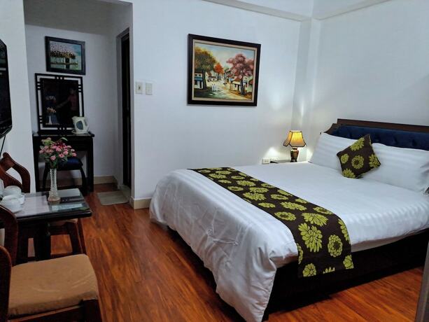 Imagen de la habitación del Hotel SOUTH GATE HOTEL. Foto 14