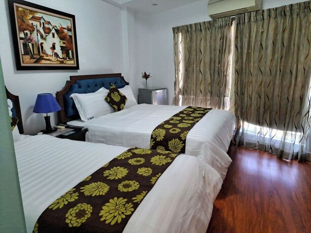 Imagen de la habitación del Hotel SOUTH GATE HOTEL. Foto 20