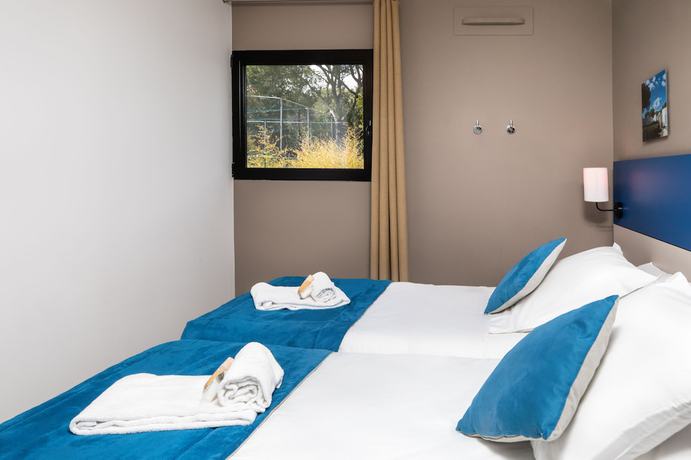 Imagen de la habitación del Hotel SOWELL Family Riviera. Foto 15