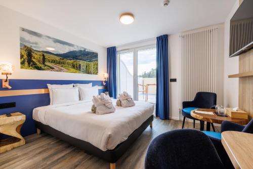 Imagen de la habitación del Hotel SPA Husseren Collections - Proche Colmar - Eguisheim. Foto 7