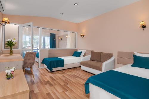 Imagen de la habitación del Hotel SPERANTA & Villas - All Inclusive and Private Beach. Foto 19