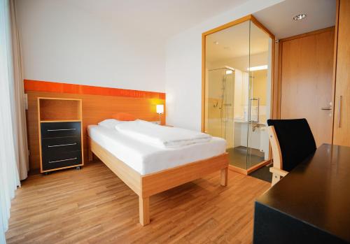 Imagen de la habitación del Hotel SPES & Seminare. Foto 15