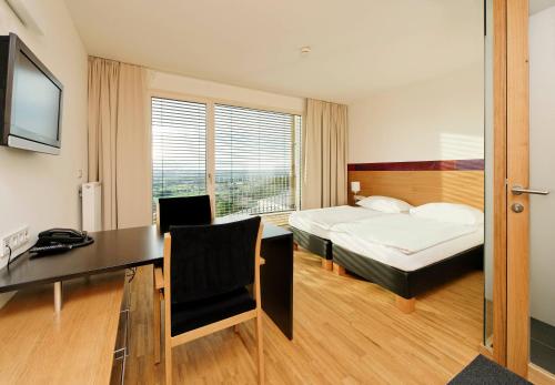 Imagen de la habitación del Hotel SPES & Seminare. Foto 16