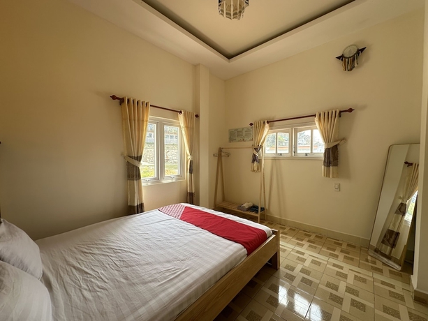 Imagen de la habitación del Hotel SPOT ON 1229 Happy Dream Homestay. Foto 2