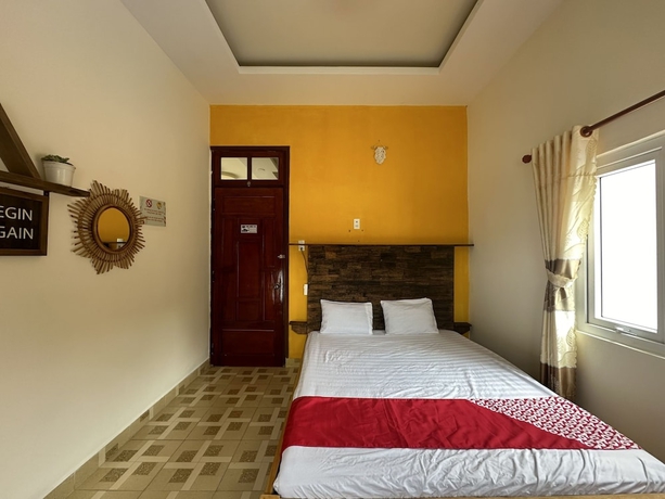 Imagen de la habitación del Hotel SPOT ON 1229 Happy Dream Homestay. Foto 11