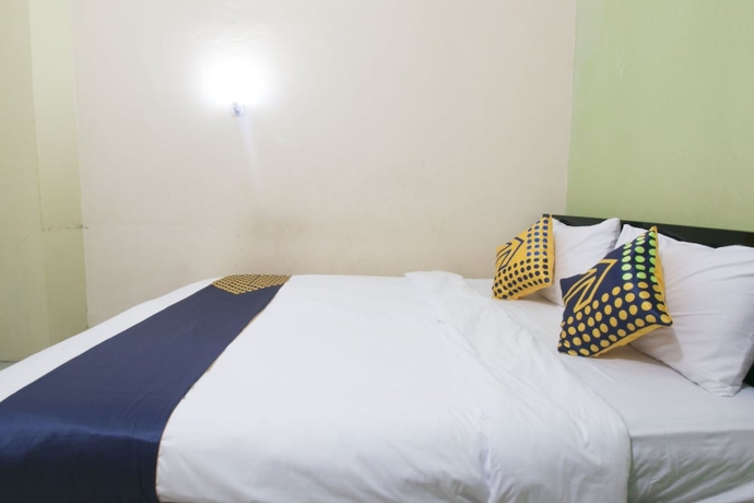 Imagen de la habitación del Hotel SPOT ON 1968 Grand Azizah. Foto 3