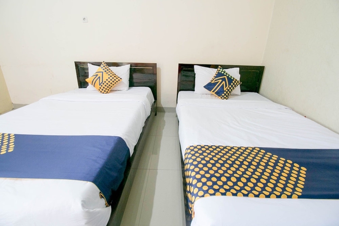 Imagen de la habitación del Hotel SPOT ON 1968 Grand Azizah. Foto 4