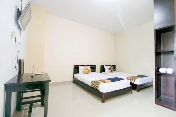 Imagen de la habitación del Hotel SPOT ON 1968 Grand Azizah. Foto 5