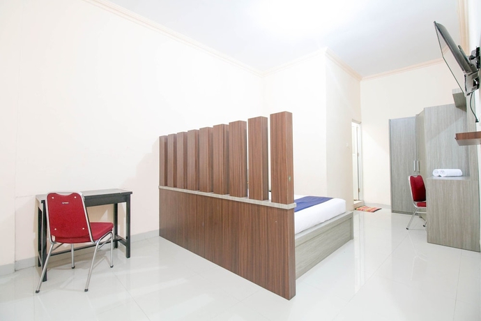 Imagen de la habitación del Hotel SPOT ON 1968 Grand Azizah. Foto 7