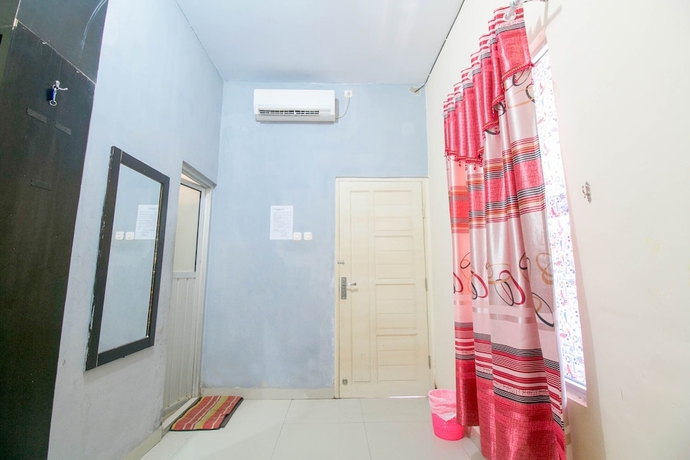 Imagen de la habitación del Hotel SPOT ON 1968 Grand Azizah. Foto 10