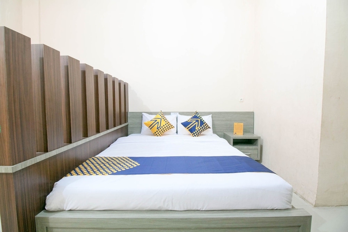 Imagen de la habitación del Hotel SPOT ON 1968 Grand Azizah. Foto 12