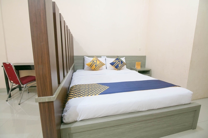 Imagen de la habitación del Hotel SPOT ON 1968 Grand Azizah. Foto 13