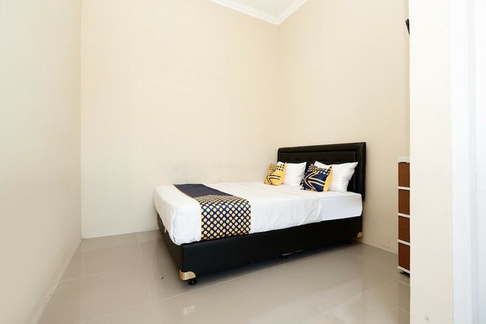 Imagen general del Hotel SPOT ON 2027 Putri Guest House Syariah. Foto 7