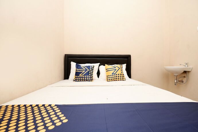 Imagen general del Hotel SPOT ON 2027 Putri Guest House Syariah. Foto 12