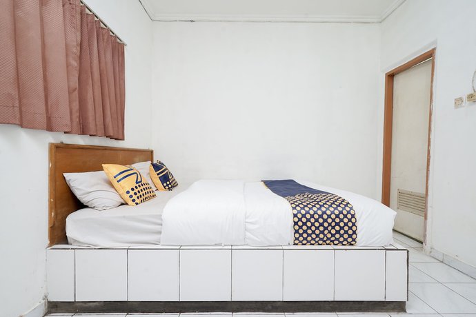 Imagen de la habitación del Hotel SPOT ON 2054 Arimbi 3. Foto 5