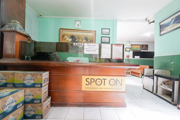 Imagen de los interiores del Hotel SPOT ON 2054 Arimbi 3. Foto 12