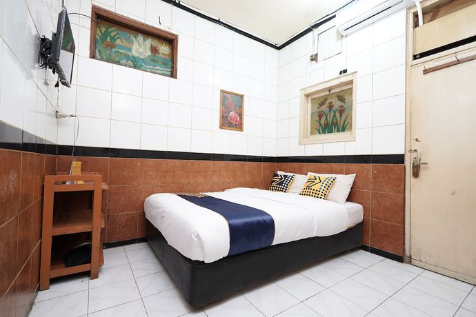 Imagen de la habitación del Hotel SPOT ON 2054 Arimbi 3. Foto 7