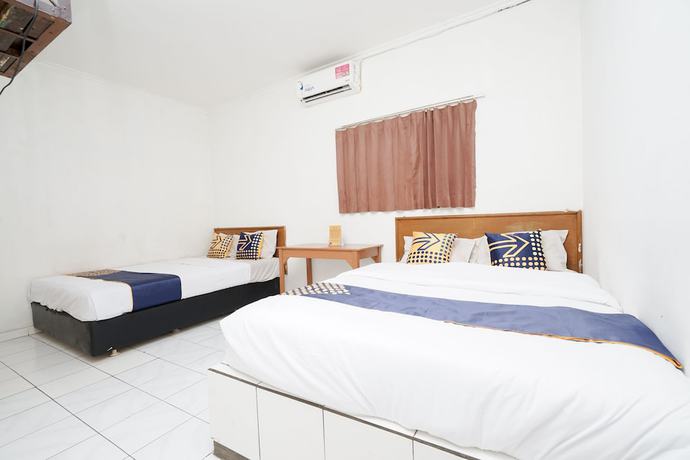 Imagen de la habitación del Hotel SPOT ON 2054 Arimbi 3. Foto 9