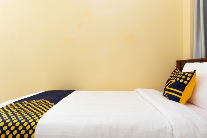 Imagen de la habitación del Hotel SPOT ON 2063 Bethania Residence. Foto 5