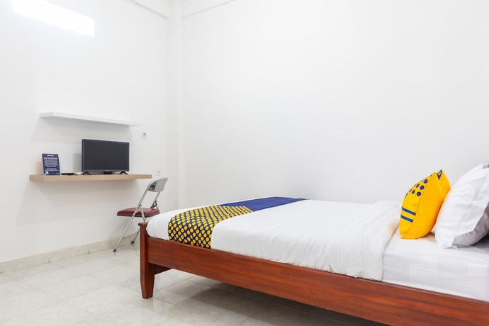 Imagen de la habitación del Hotel SPOT ON 2063 Bethania Residence. Foto 6