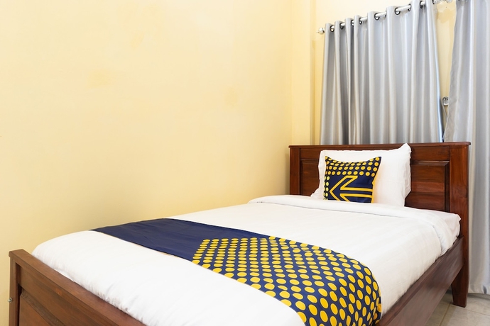 Imagen de la habitación del Hotel SPOT ON 2063 Bethania Residence. Foto 9