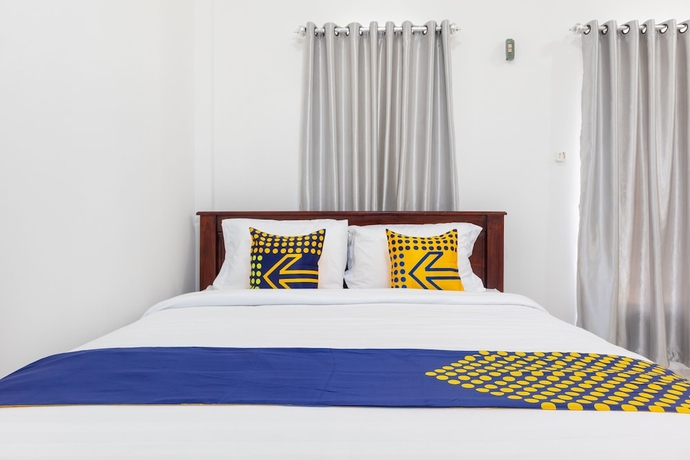 Imagen de la habitación del Hotel SPOT ON 2063 Bethania Residence. Foto 11