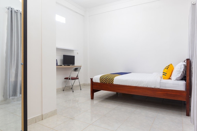 Imagen de la habitación del Hotel SPOT ON 2063 Bethania Residence. Foto 12